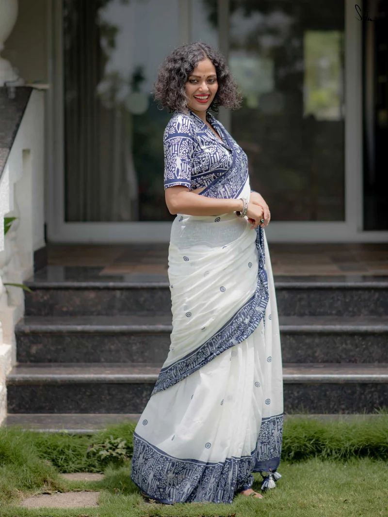 Premium white soft silk saree with intricate blue border print perfect for party and traditional occasions