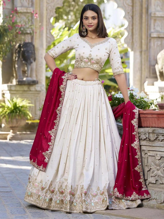 White embroidered lehenga choli with pink dupatta for wedding and festive wear