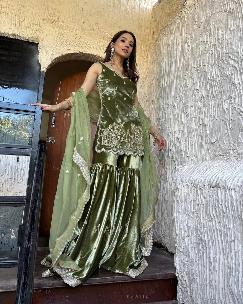 Luxury olive green velvet sharara suit with embellished hemline and dupatta