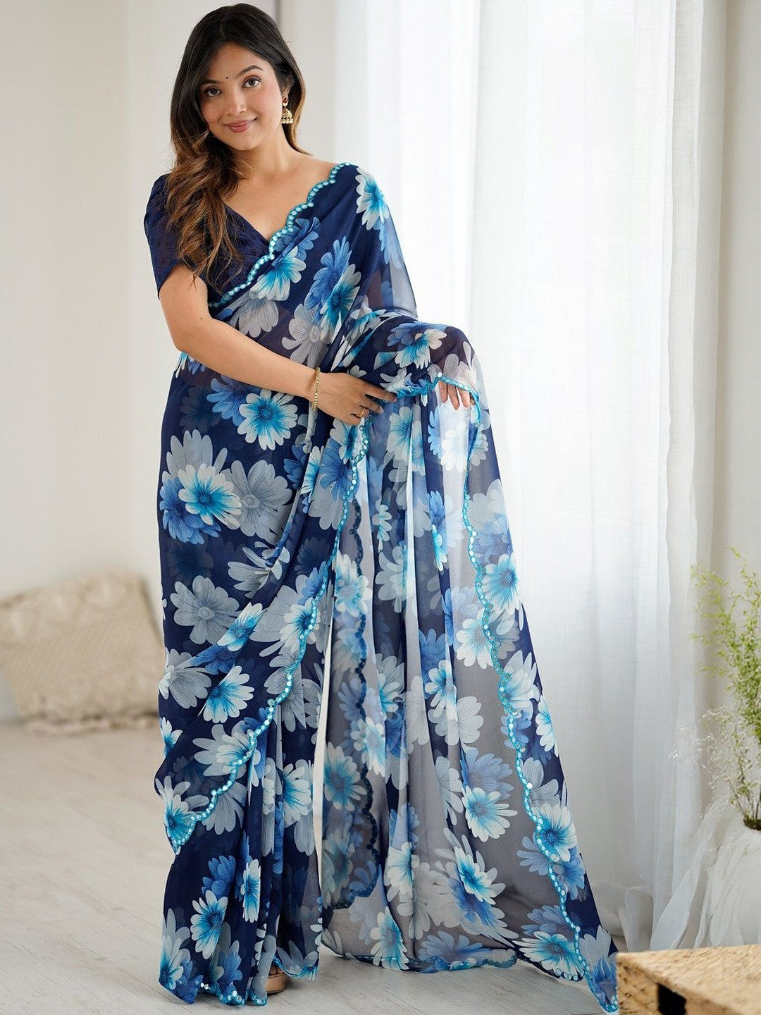 Women's blue designer georgette silk floral printed saree with unstitched blouse piece