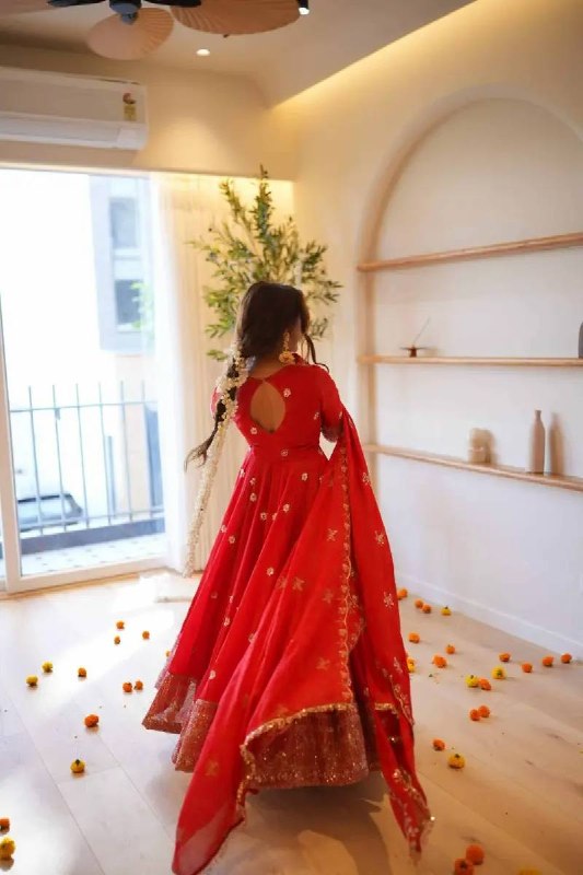 Traditional red festive wear gown with golden embroidery and dupatta