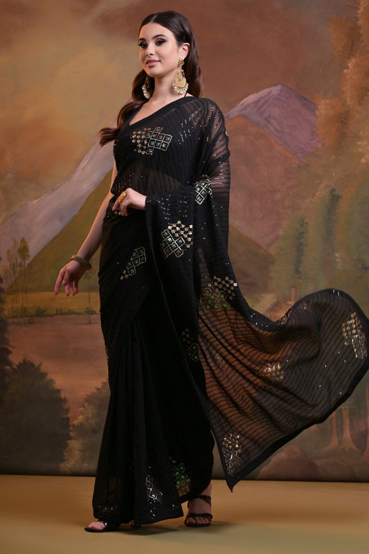 Elegant black Soft Georgette saree featuring lining sequence embroidery and backpatch lace border.