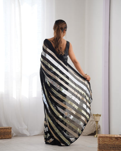 Elegant black party wear georgette saree with designer sequin work