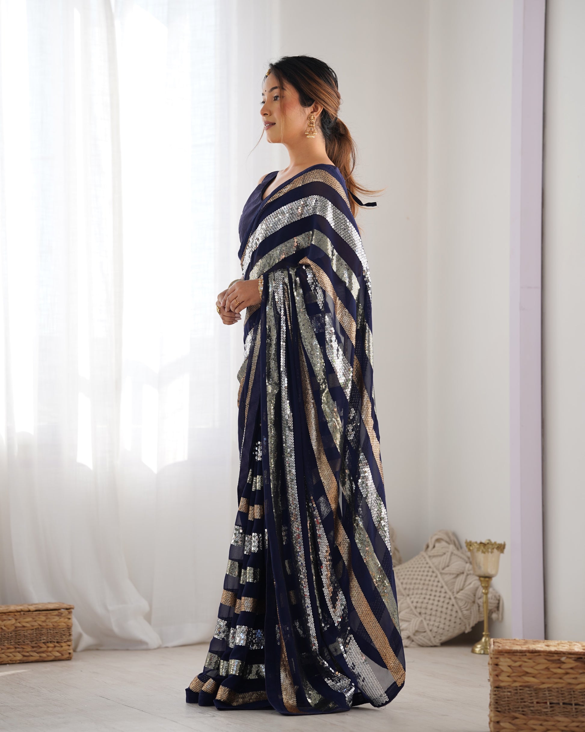 Blue embroidered georgette saree with Mono Banglory blouse piece