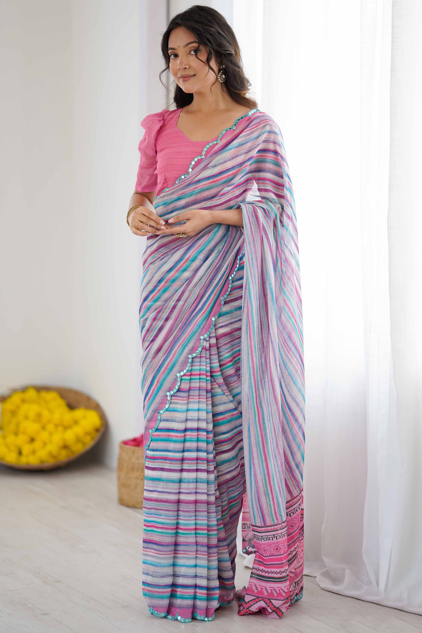 Blue Heavy Georgette Printed Saree with Mirror Work Border