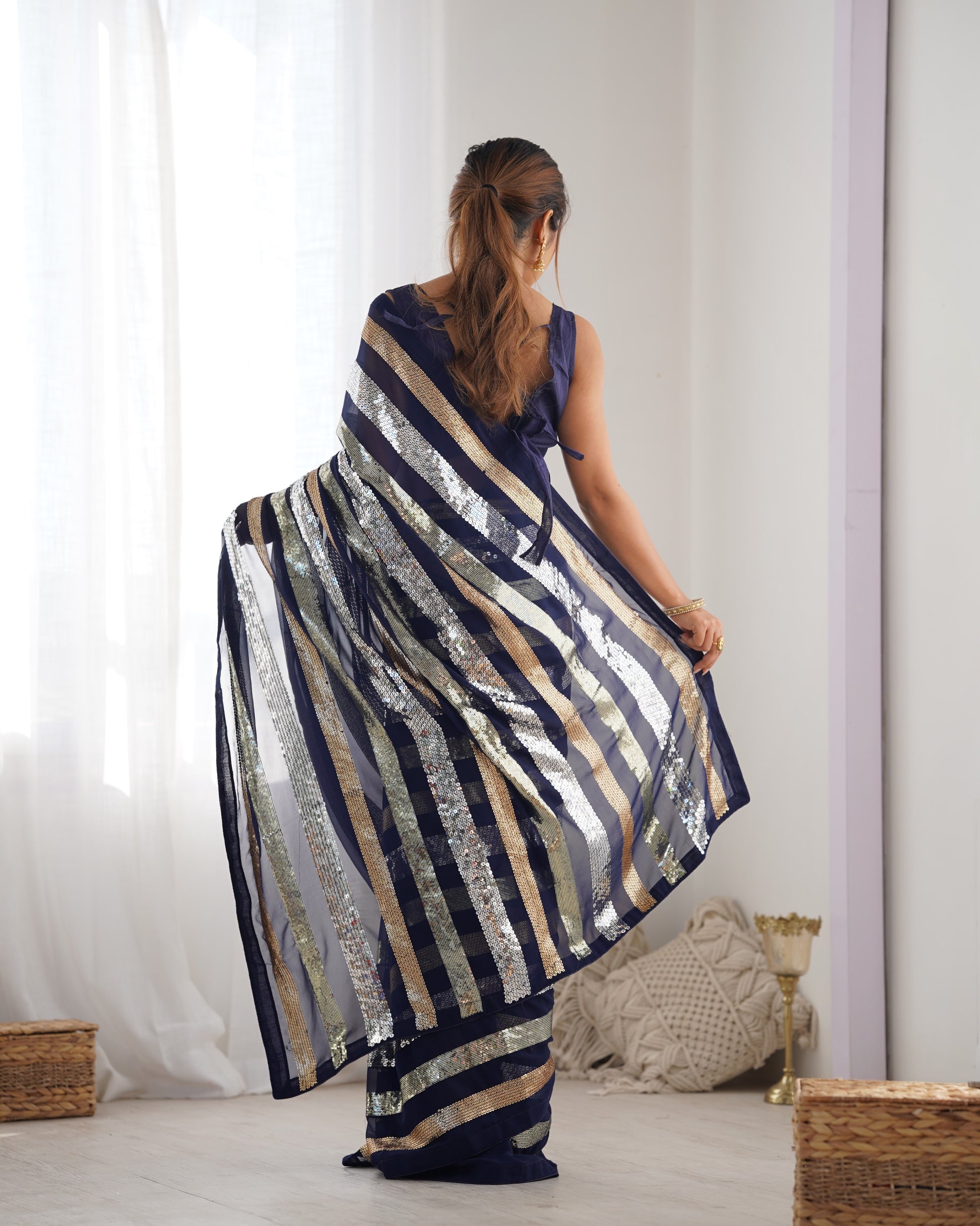 Blue party wear georgette saree with designer sequin work