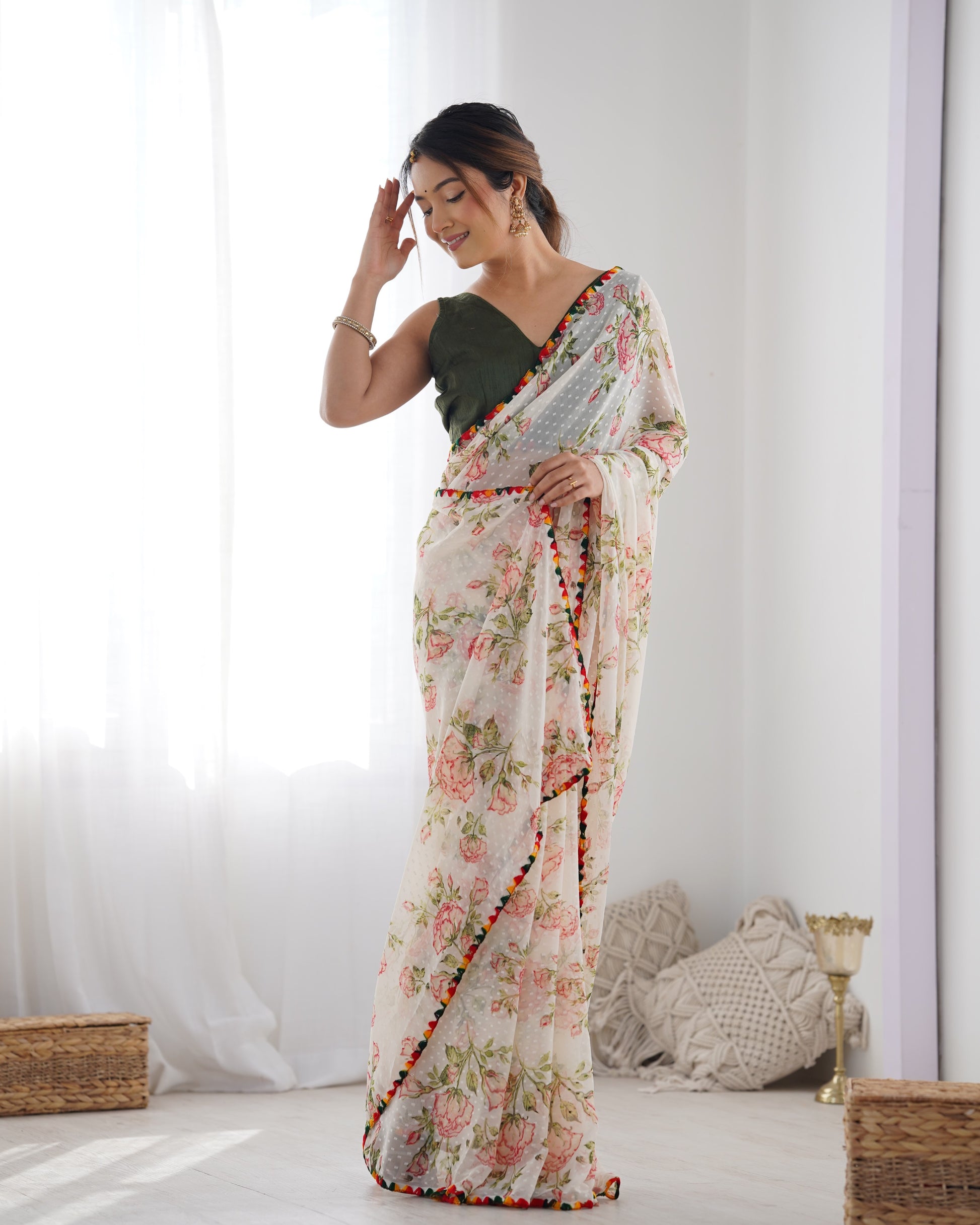 Bollywood Style White Floral Print Saree with Colorful Jhumka Lace Border
