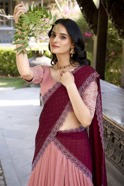 Elegant blush pink lehenga featuring heavy embroidered floral border and matching blouse