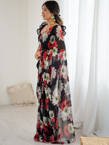 Designer black georgette silk saree with floral print and mirror work lace border