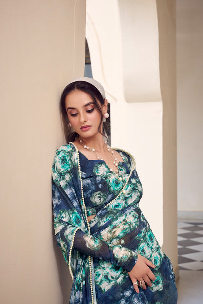 Designer blue floral print Soft Georgette saree with elegant pearl lace border for party wear.