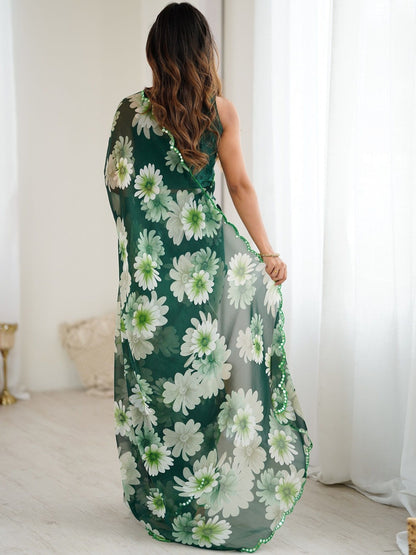 Designer green georgette silk saree with floral print and mirror work lace border