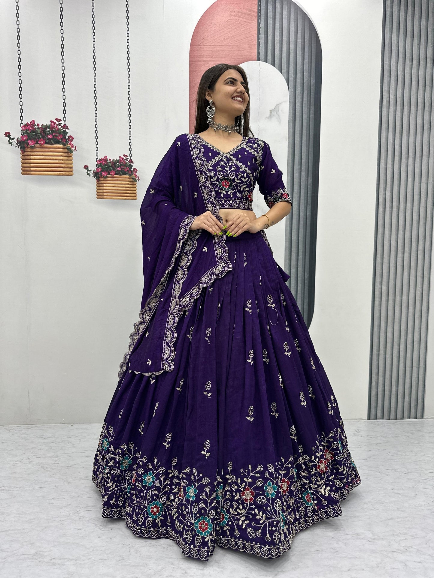 Designer purple bridal lehenga choli with floral embroidery and elegant dupatta