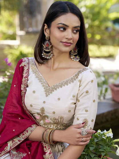 Designer white lehenga choli with heavy embroidery and pink dupatta
