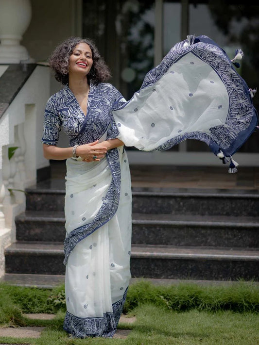 Elegant white and blue printed ethnic saree crafted in soft silk fabric for women