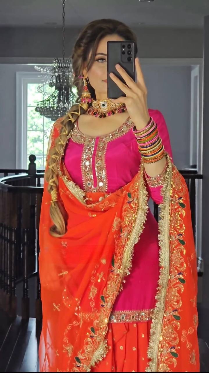 Malai silk dhoti suit side view showing full sleeves and embroidery