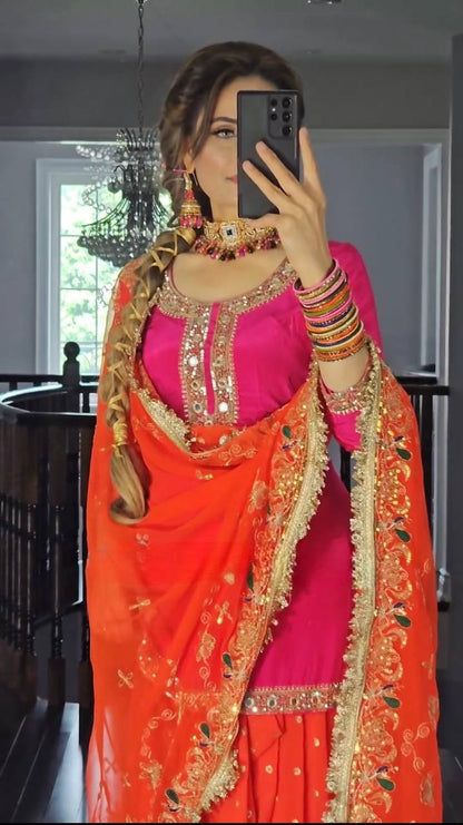 Malai silk dhoti suit side view showing full sleeves and embroidery
