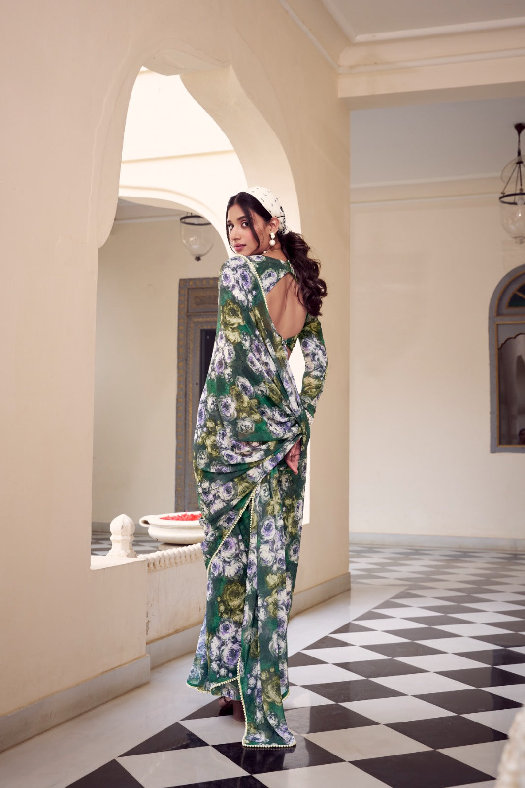 Olive green floral printed Soft Georgette saree with premium Moti lace border front view.

