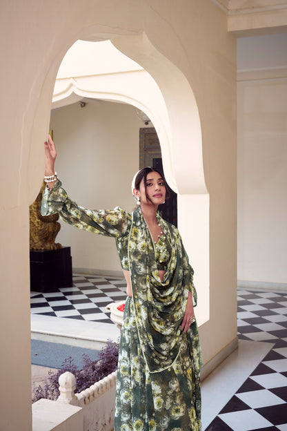 Full-length olive green floral printed Soft Georgette saree with matching floral print blouse.