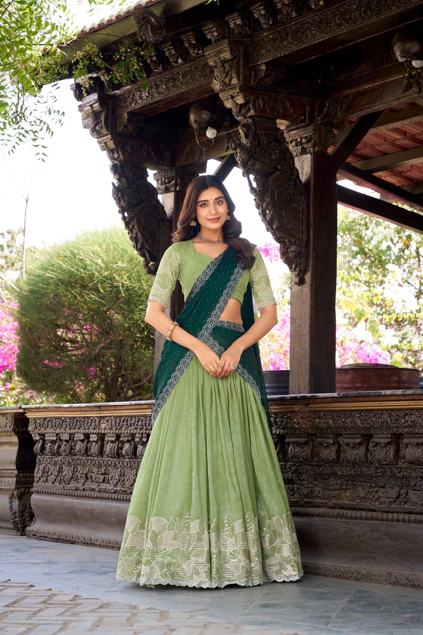 Parrot green embroidered lehenga with maroon dupatta and designer blouse front view