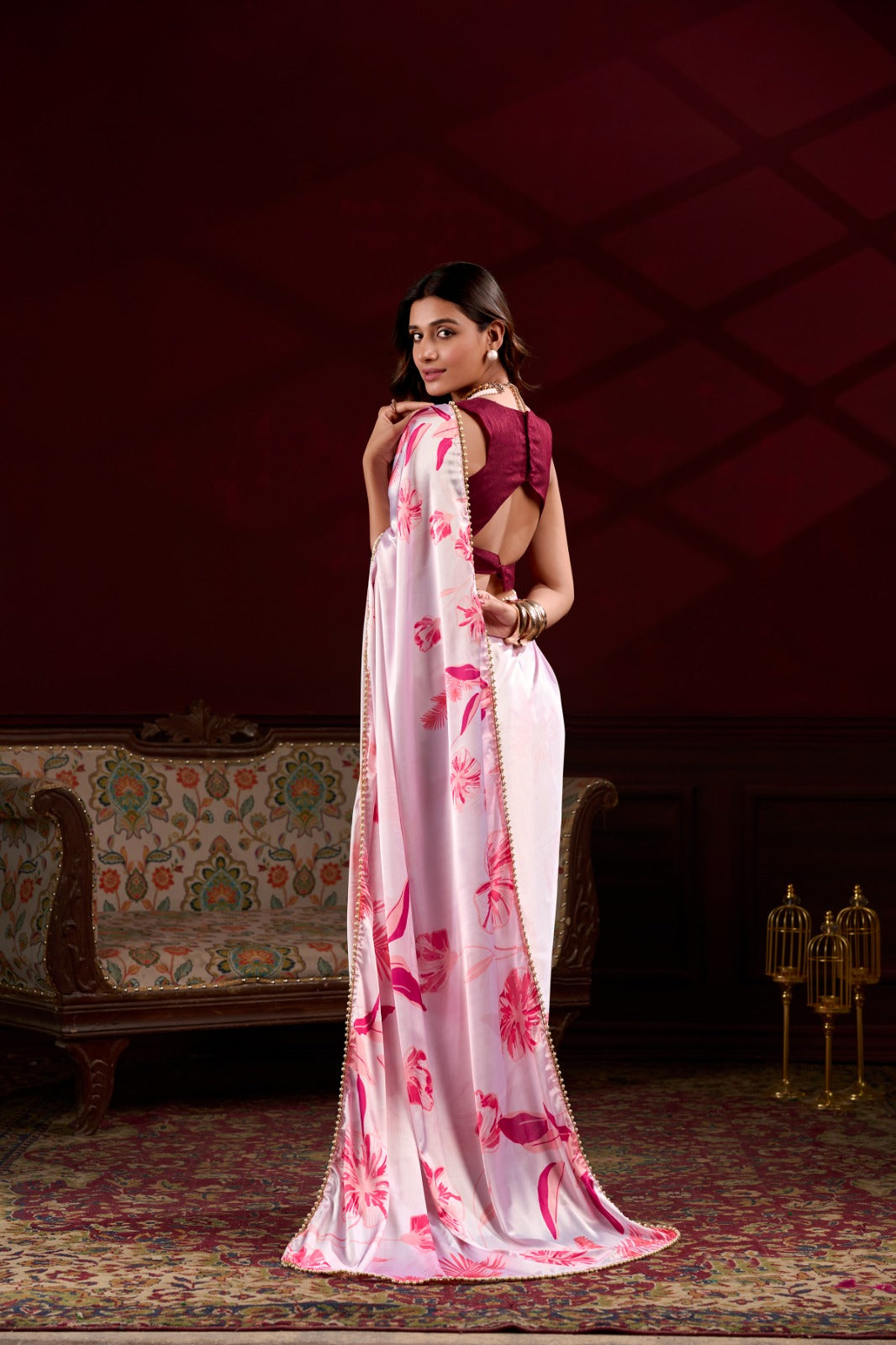 Pink Japan Satin Silk floral printed saree with pearl lace border front view for women.