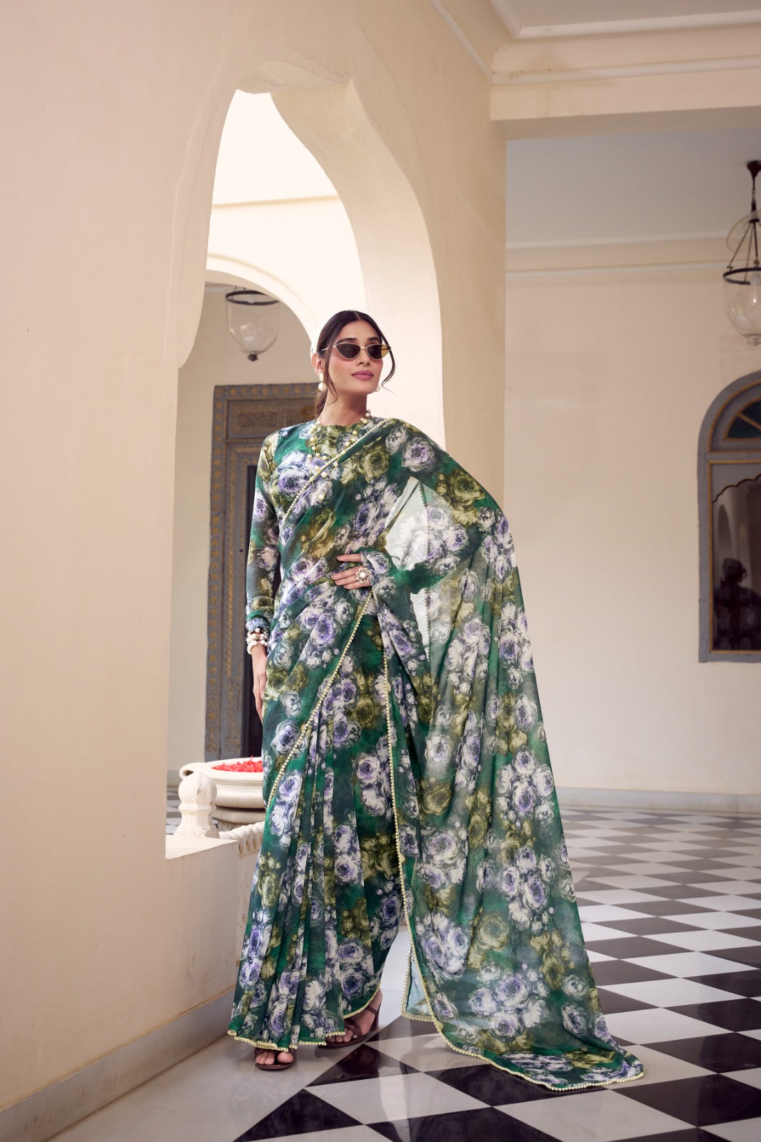Premium olive green floral printed Soft Georgette party wear saree with elegant Moti lace border.