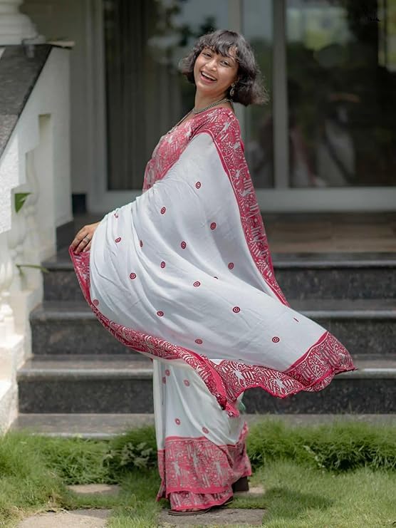 Elegant white linen cotton ethnic saree with red printed design and soft fabric