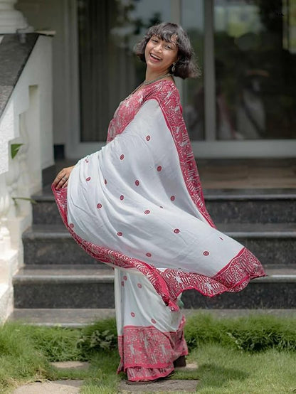 Elegant white linen cotton ethnic saree with red printed design and soft fabric