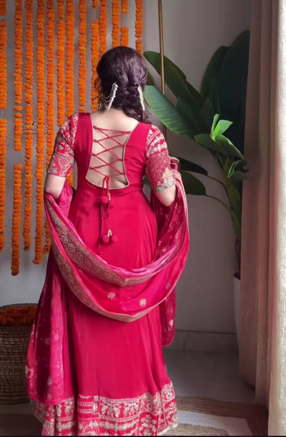 Red bridal Anarkali suit back view with embroidered dupatta drape