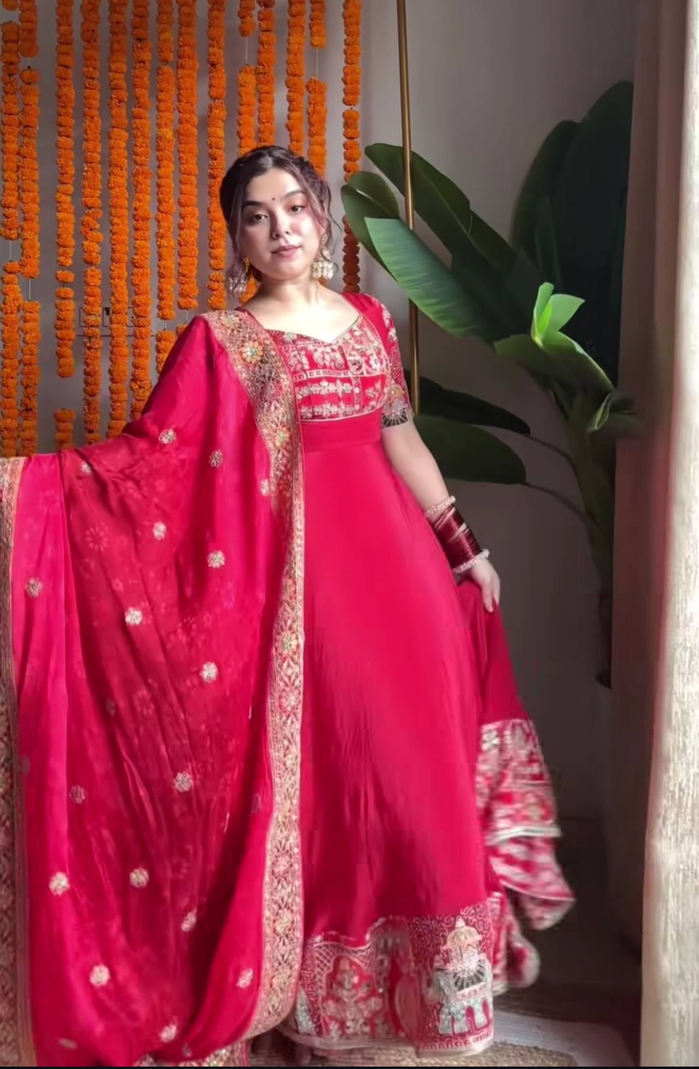 Red heavy embroidered Anarkali gown with sequence work and dupatta front view