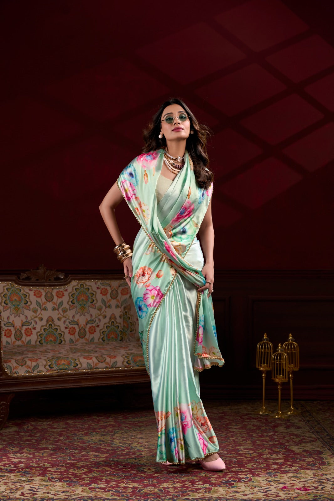 Sea green Japan Satin Silk floral printed saree with pearl lace border front view for women.