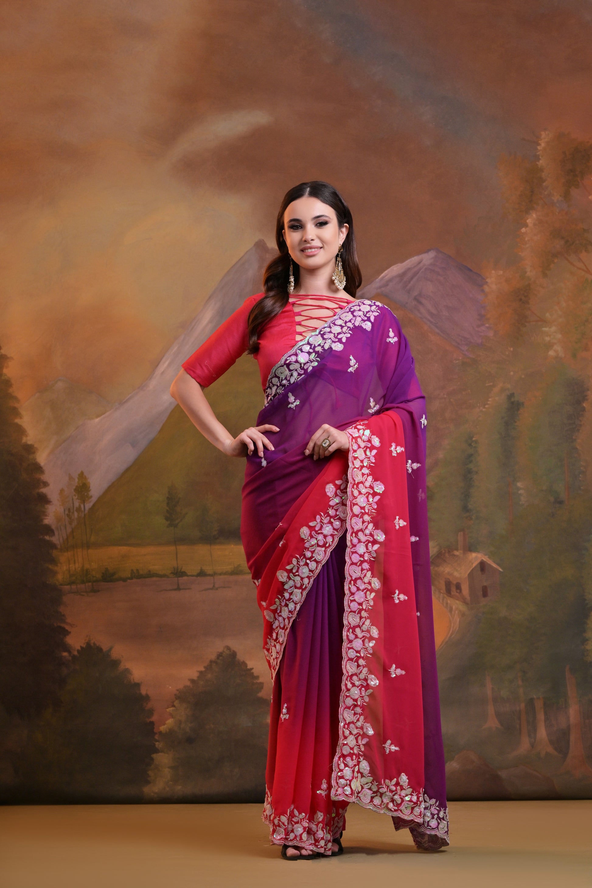 Purple and pink Soft Georgette wedding party wear saree with embroidered border and stylish designer look.